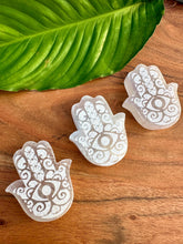 Load image into Gallery viewer, SELENITE Hamsa Hand Crystal, Natural Tumbled Polished Hand of Fatima Palm Stone with Evil Eye, Crystals for Protection, Peace, Meditation