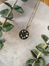 Load image into Gallery viewer, Moon Phases Black &amp; White Gold Medallion Necklace