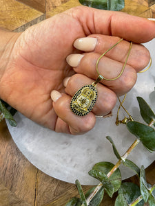 Meditating Buddha Black & Gold Medallion Necklace